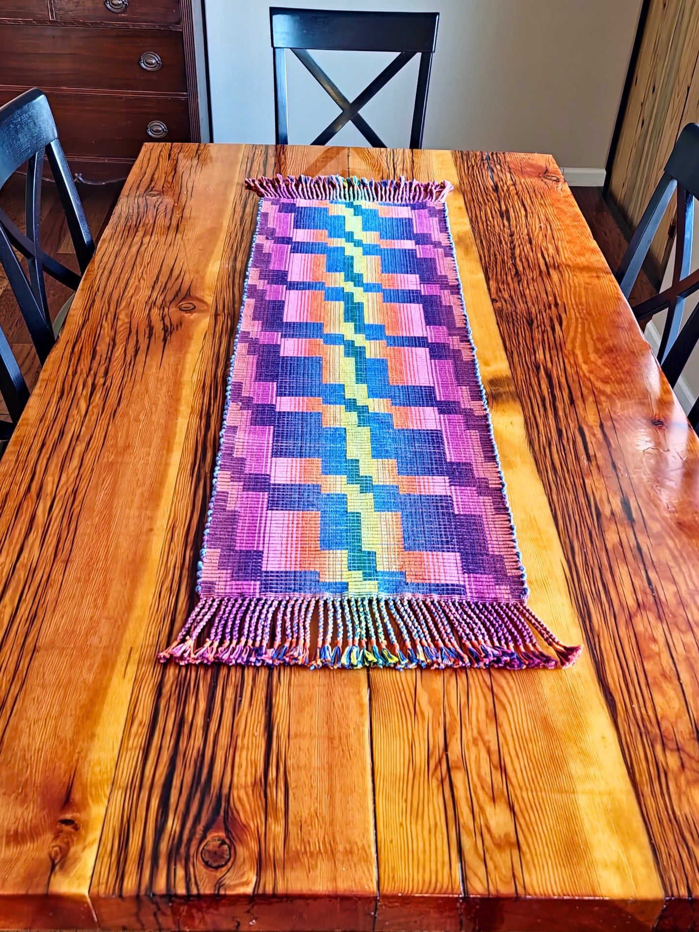 Looking Over The Brink Runner on wood table