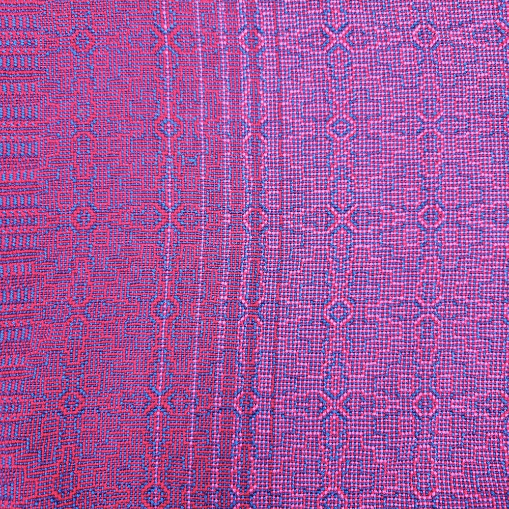Close up of the I Shall Wear Red Mobius Shawl
